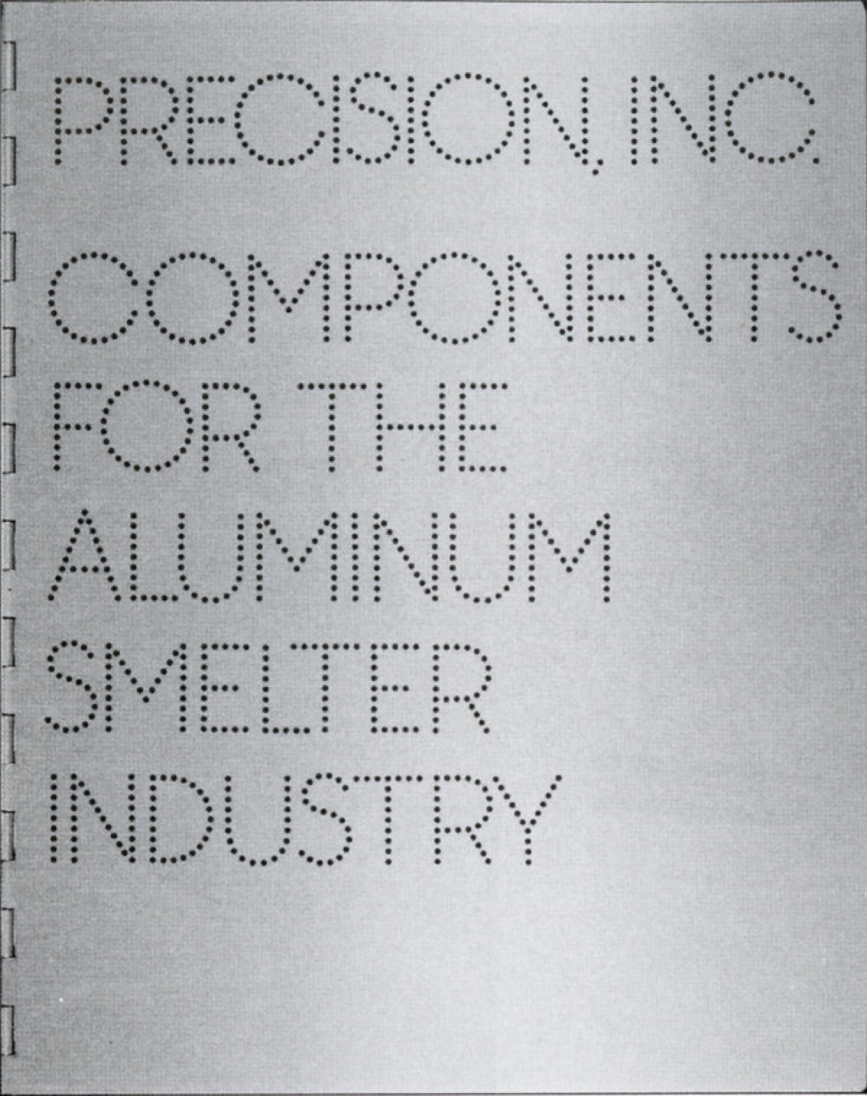 Reference: letters built entirely from small dots on a silver industrial cover